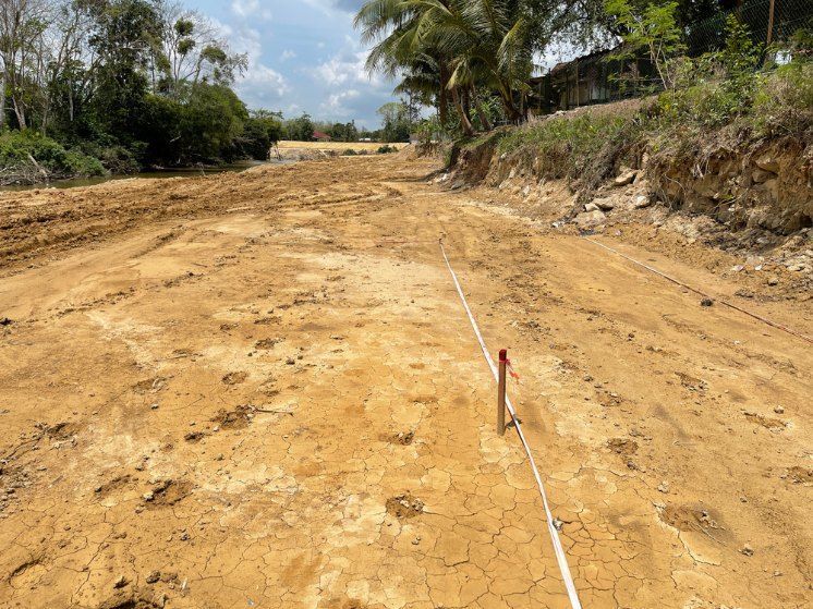 A white line is being drawn on a dirt road — Bennettron Demex in Corindi Beach, NSW