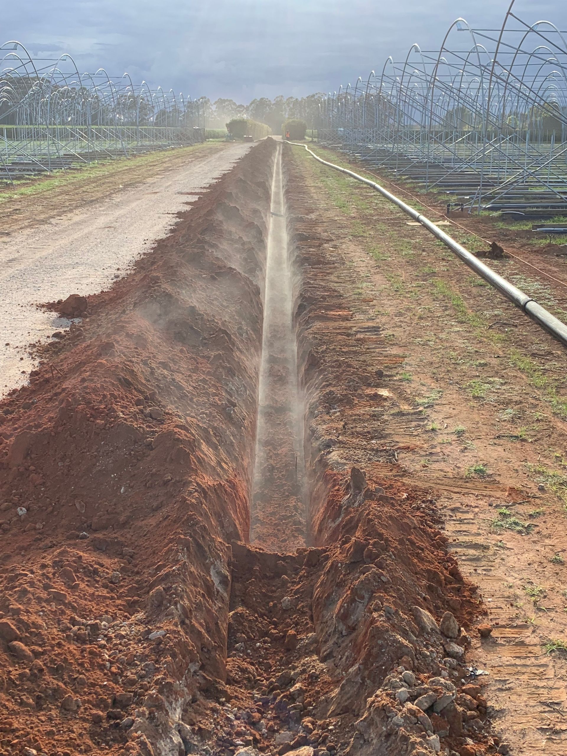 A bank has been dug in a field of mud — Bennettron Demex in Corindi Beach, NSW