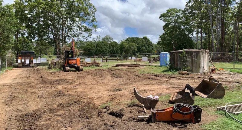A Construction Site With a Lot of Dirt and Trees in the Background — Bennettron Demex in Corindi Beach, NSW