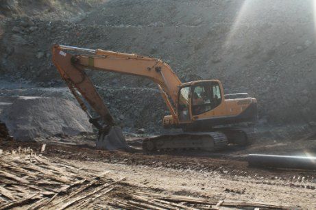 A Large Excavator is Working on a Construction Site — Bennettron Demex in Evans Head, NSW