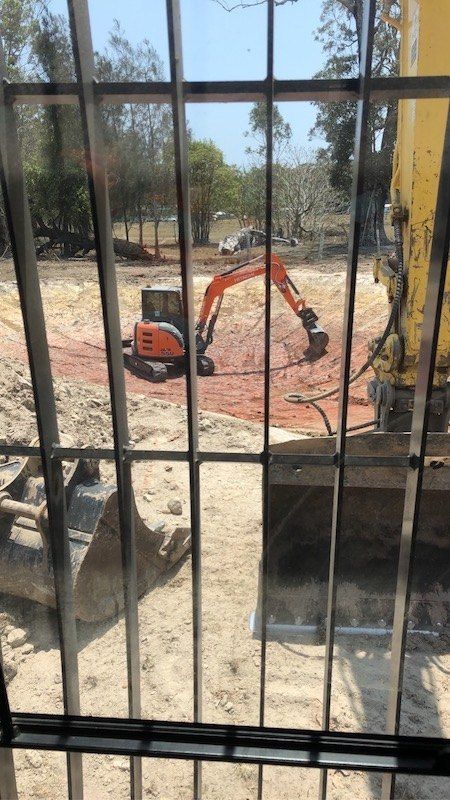 A View of a Construction Site Through a Fence — Bennettron Demex in Ulmarra, NSW