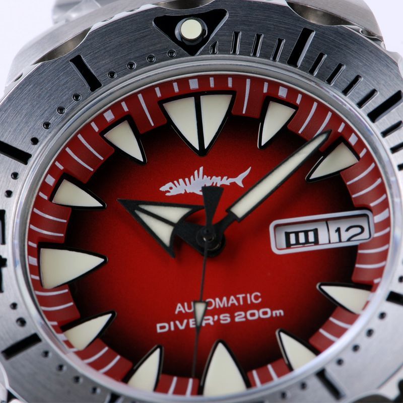 A silver and red automatic diver 's 200m watch