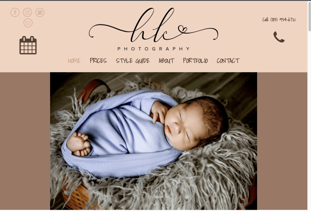 Newborn baby wrapped in a blue blanket, resting in a fluffy basket.