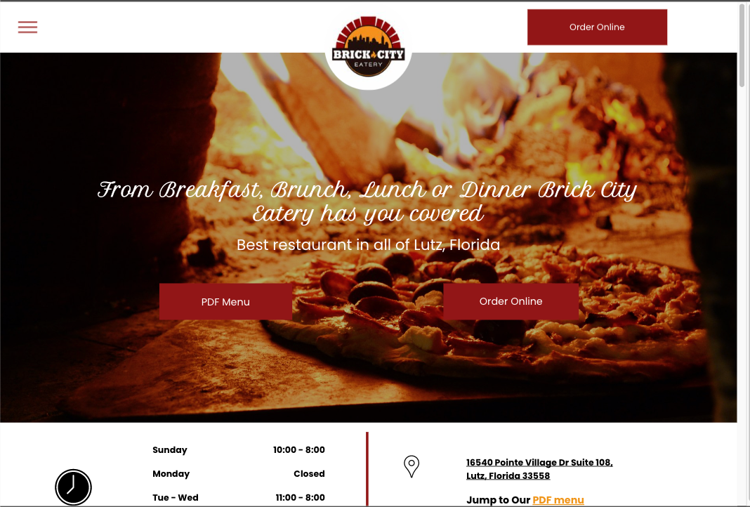 Website homepage: Brick City logo, text overlay, pizza baking in oven, and navigation buttons.
