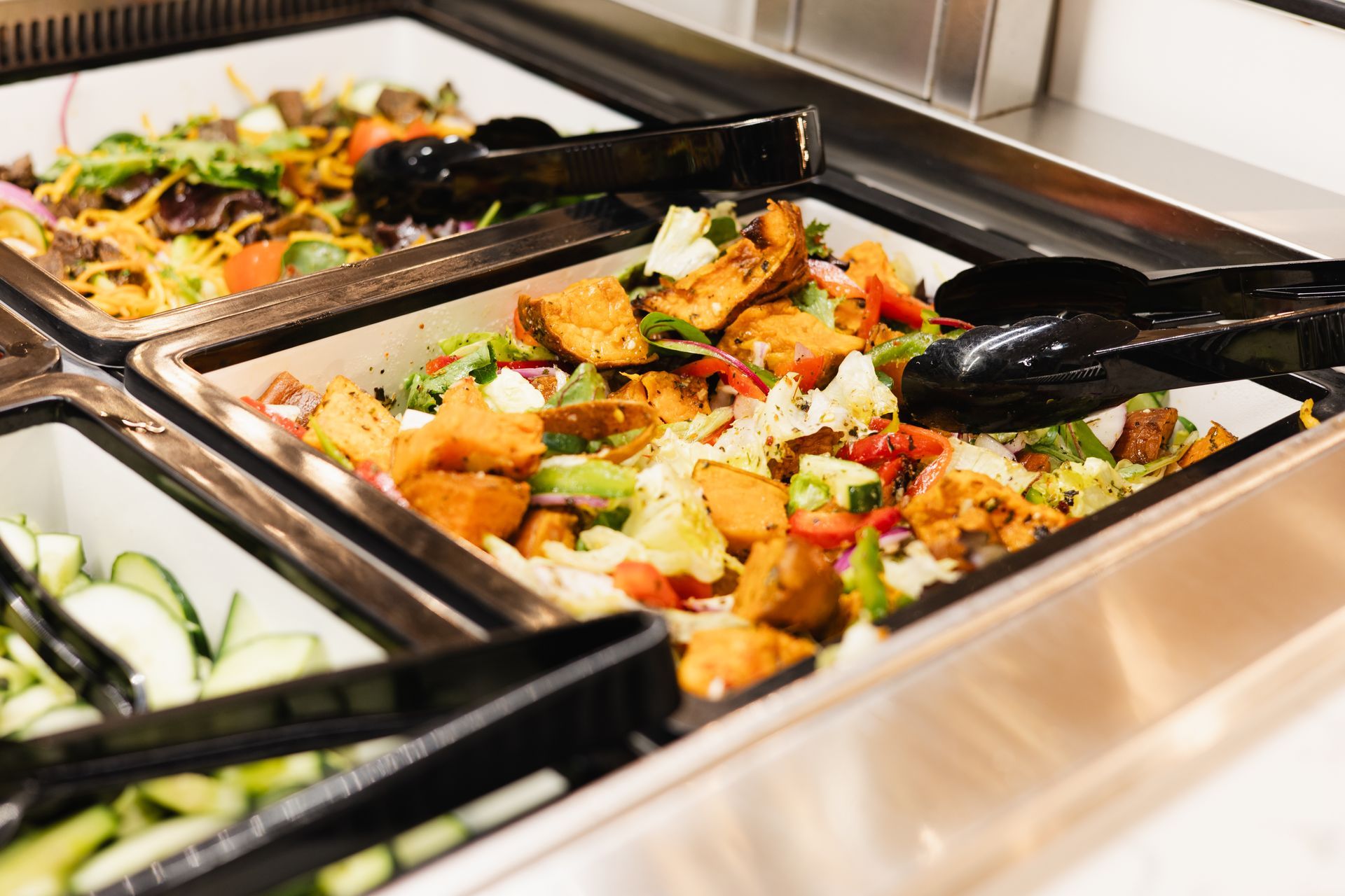 A salad is pictured in the student buffet.