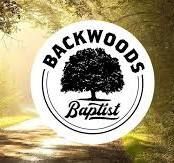 A circular logo with the text 