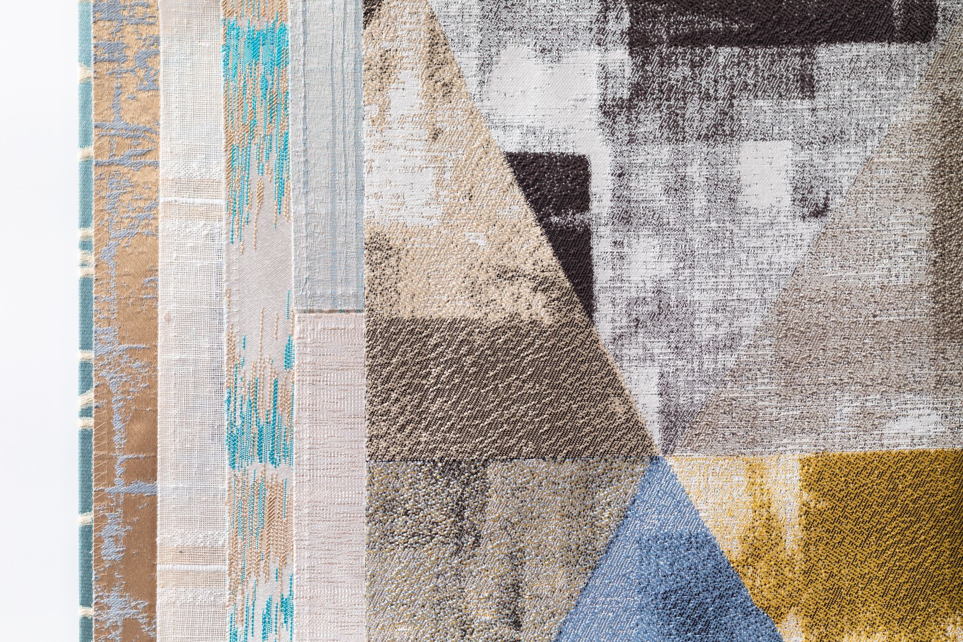 A close up of a rug with a geometric pattern on it.