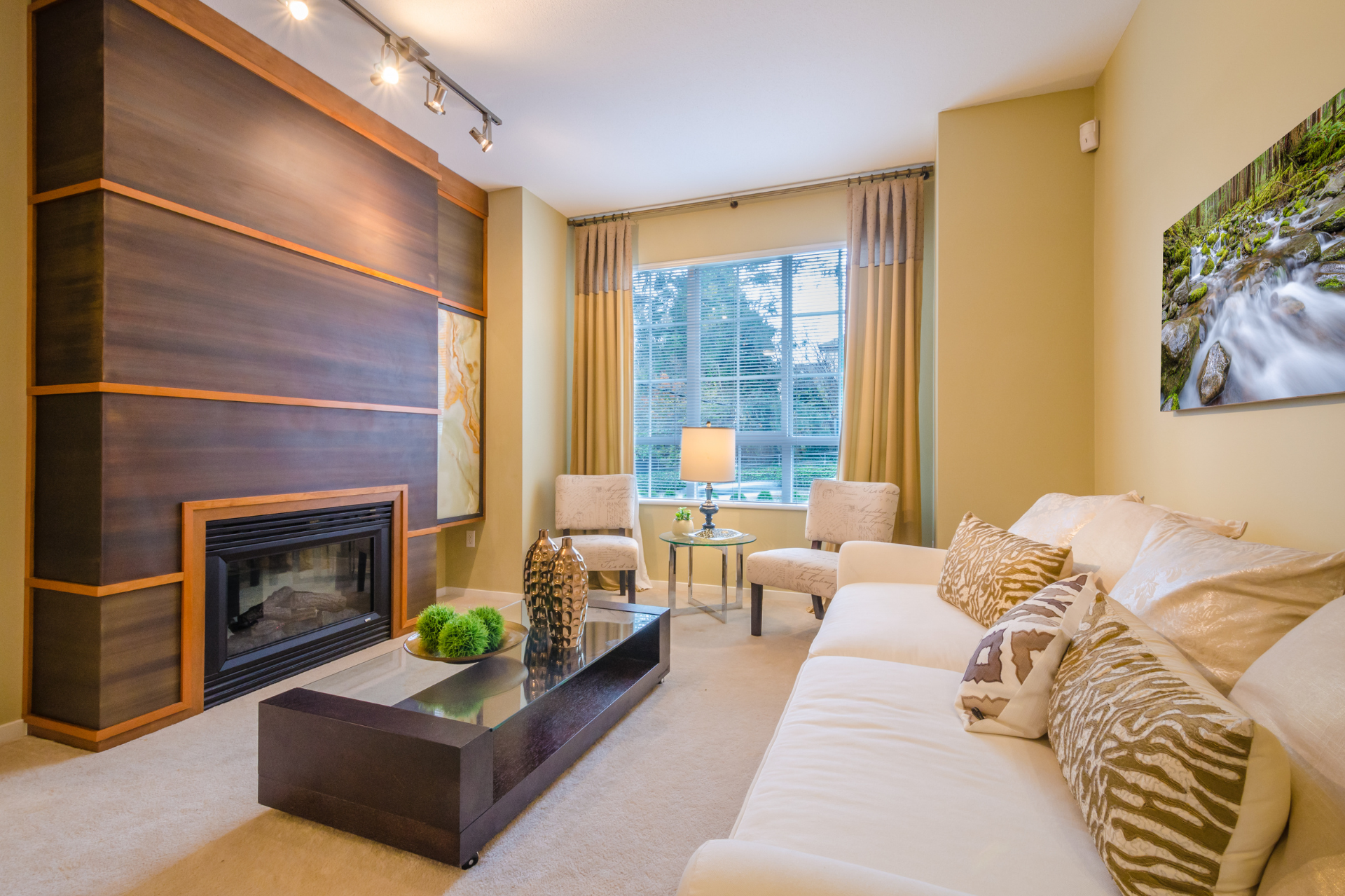 A living room with a fireplace and a couch