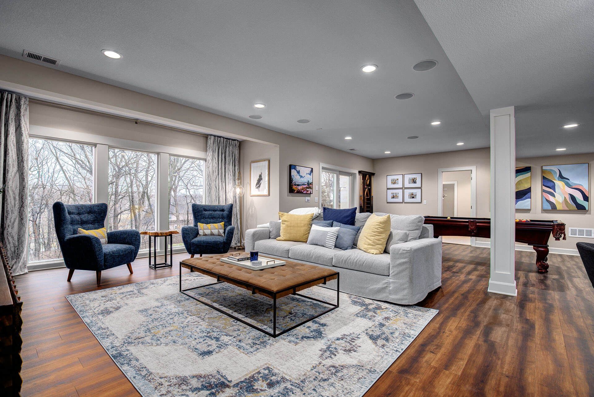 An individual applying texture to a wall using a roller, creating a unique surface pattern with smooth and even strokes.