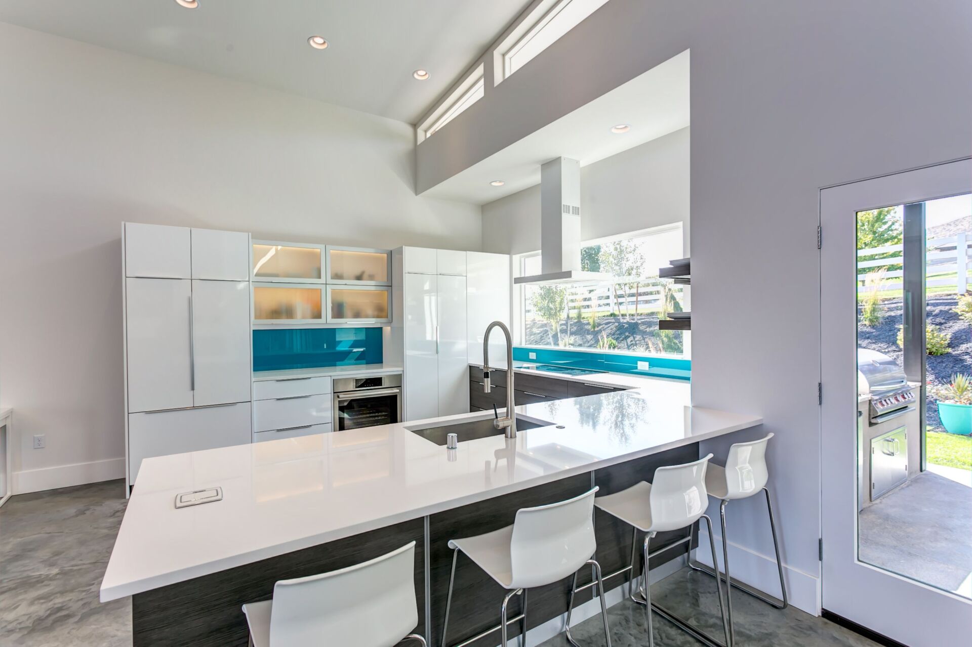 There is a large island in the middle of the kitchen.