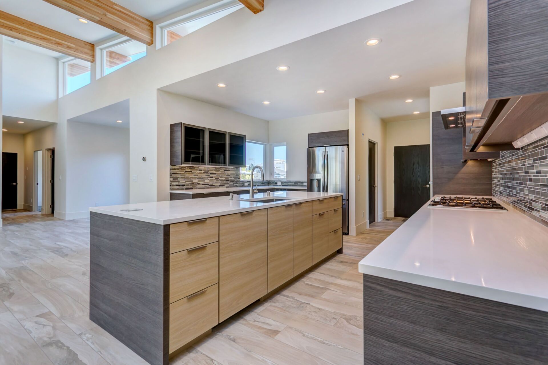 There is a large island in the middle of the kitchen.