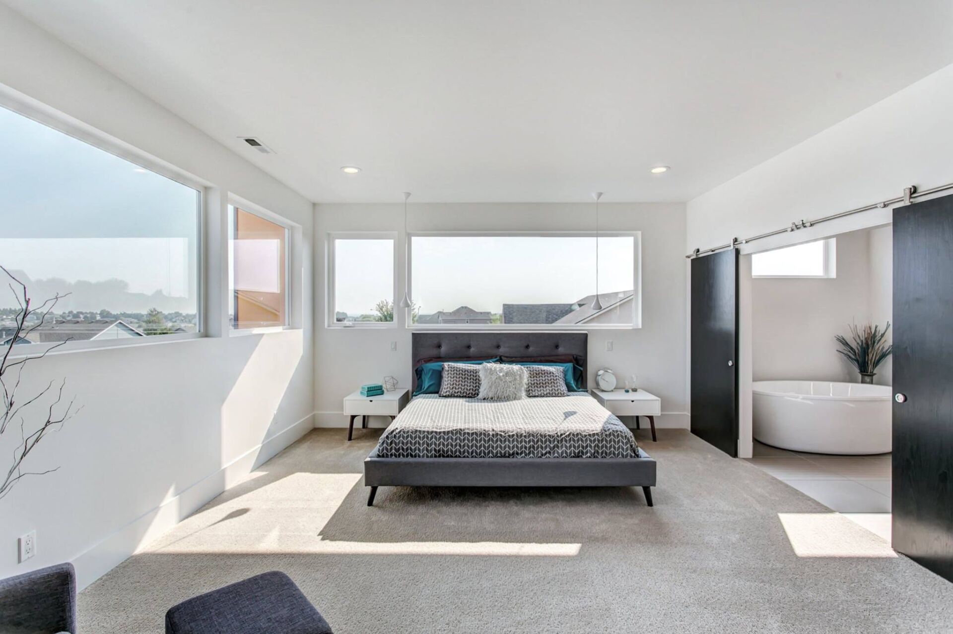 There is a large bed in the middle of the room.