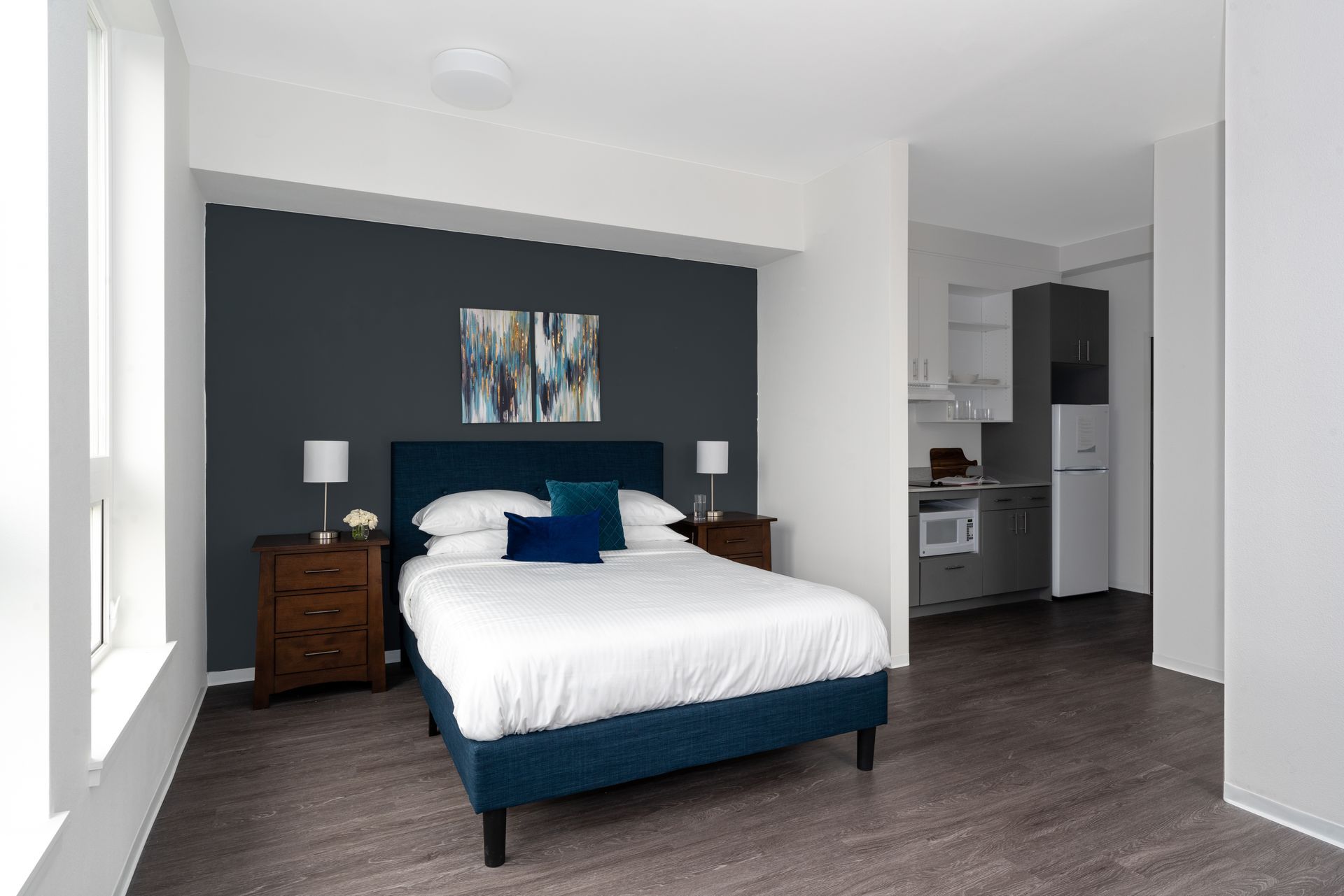bed area showing plenty of natural lighting