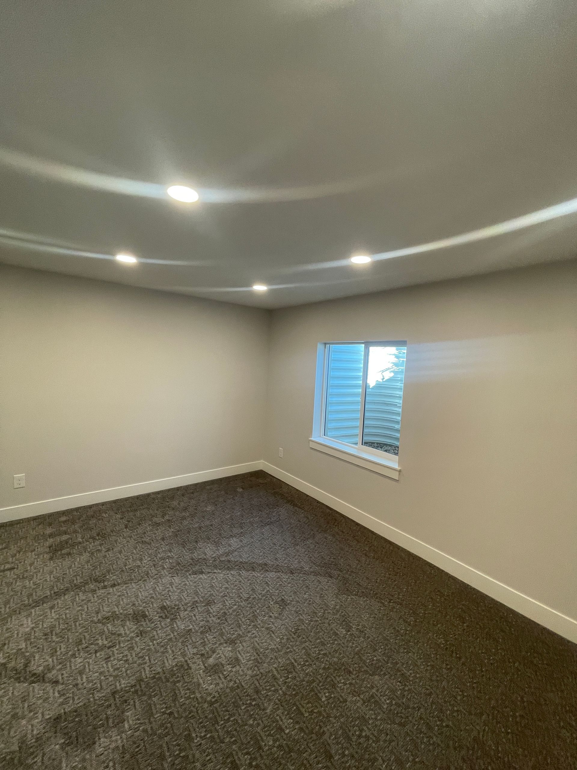 There is a window in the middle of the room.