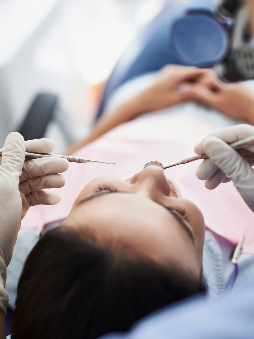 Girl receiving amalgam removal treatment