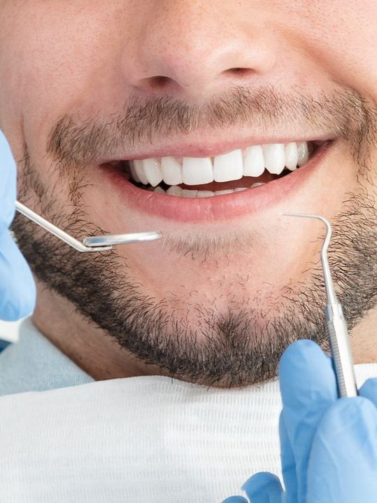 Patient taking a dental exam