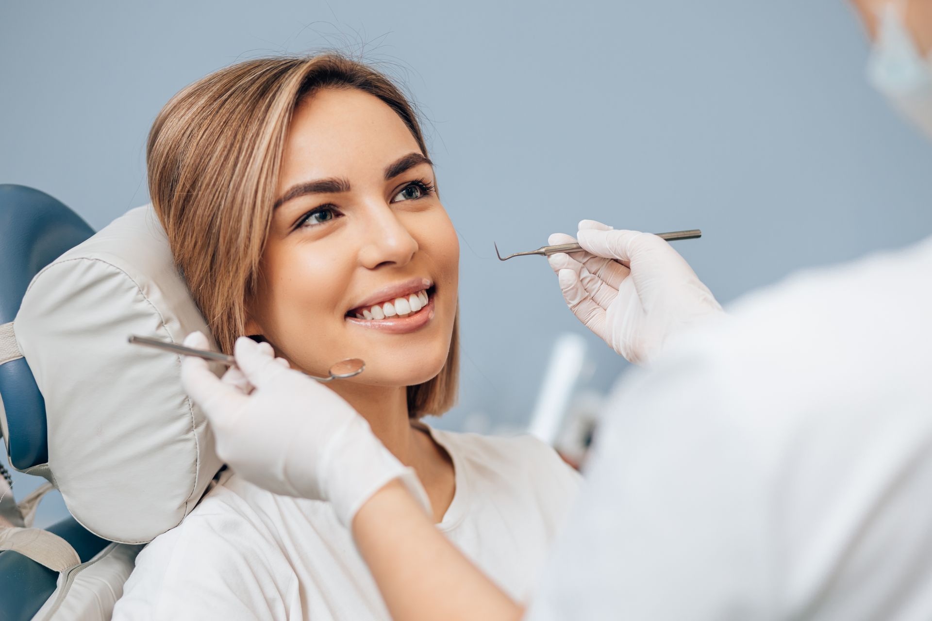 Girl receiving fluoride treatment