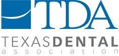The logo for the texas dental association is blue and white.