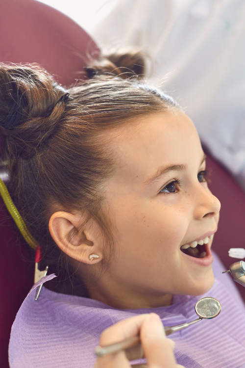 Patient taking a dental exam