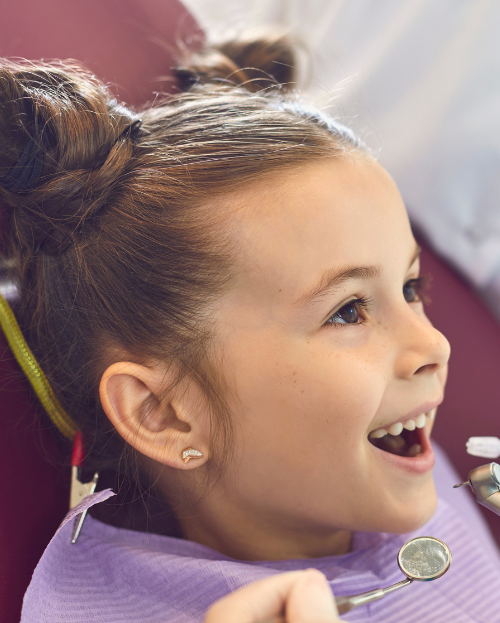Patient taking a dental exam