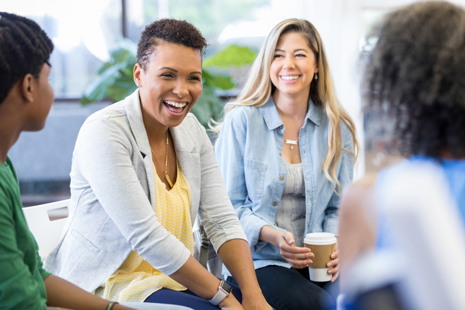 women laughing | best cosmetic dentist in oak point tx 