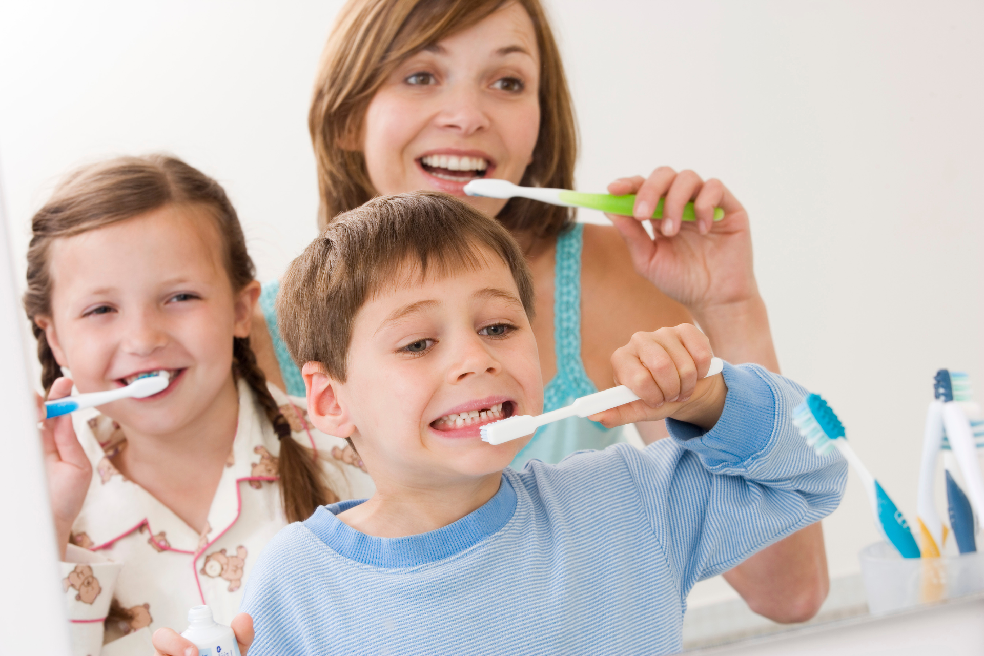 Mom and Kids Brushing Teeth | Top Family Dentist for Fillings, Smile Makeovers | Oak Point TX 75068