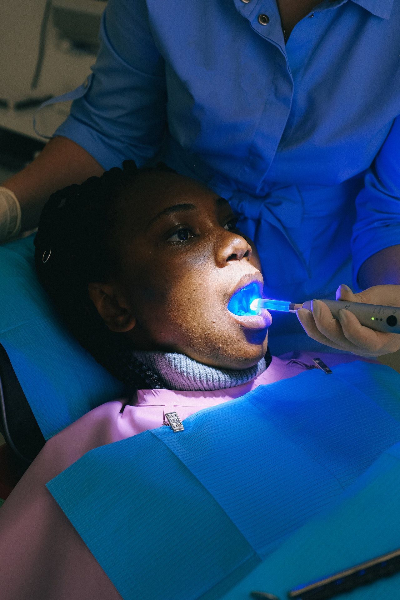 Patient taking a dental exam