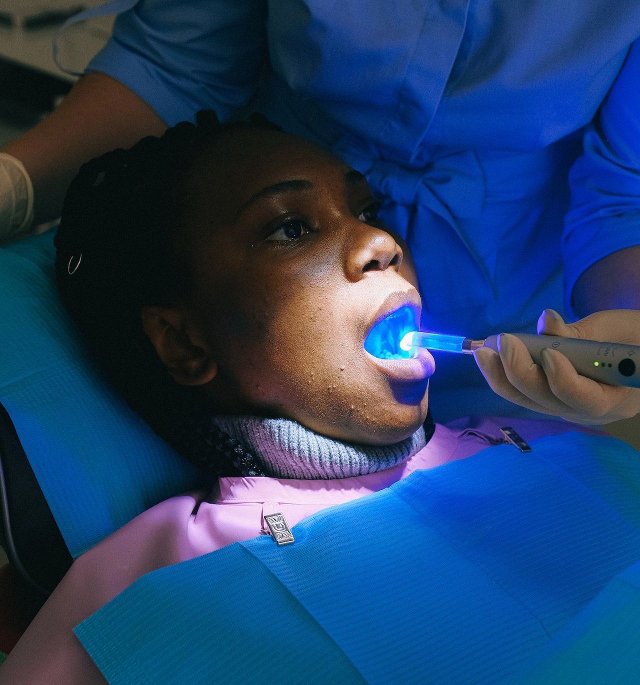 Patient taking a dental exam