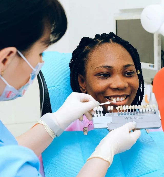 Patient taking a dental exam