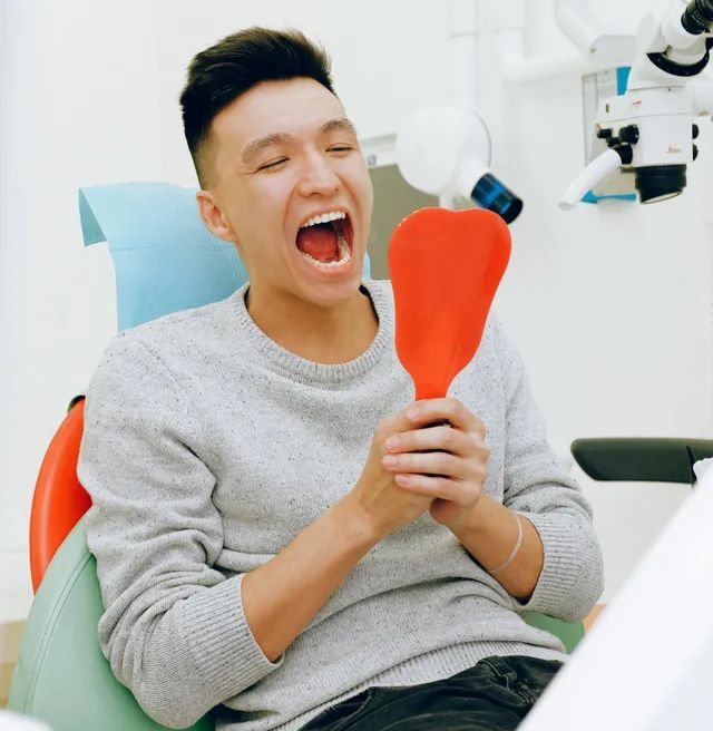 Patient taking a dental exam