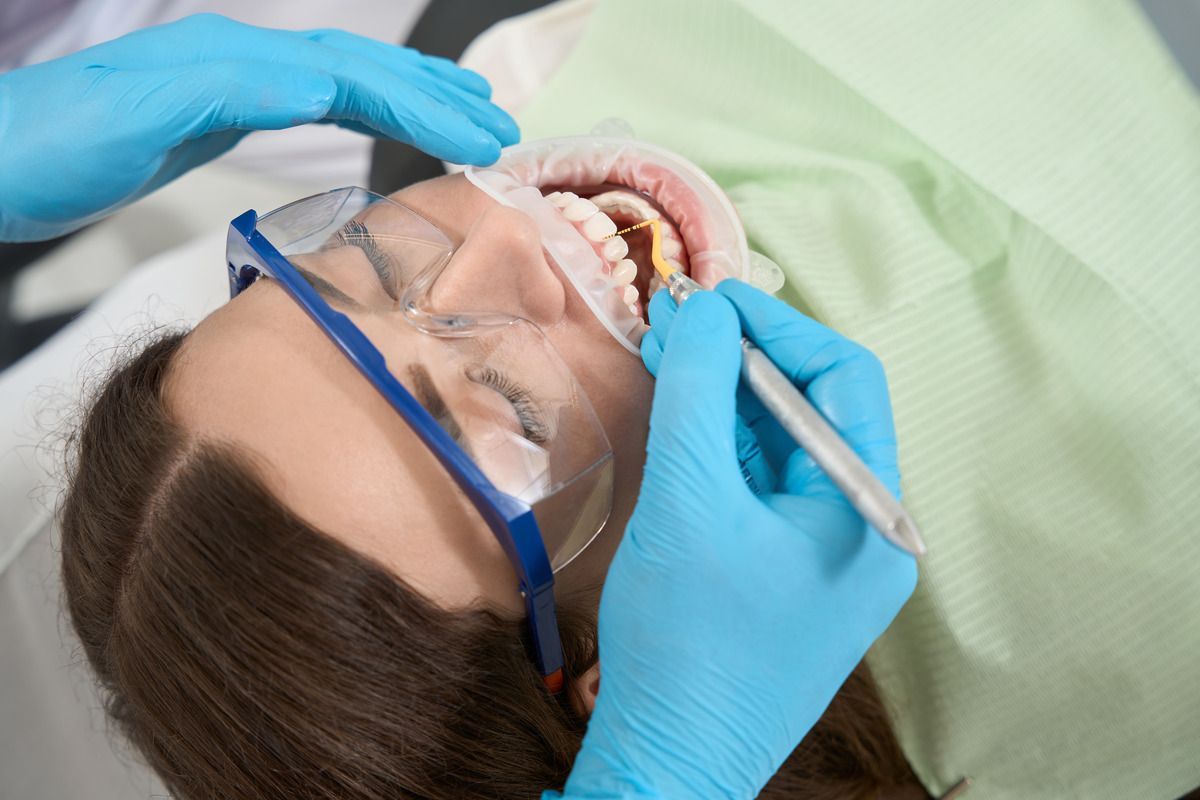 Patient taking a dental exam