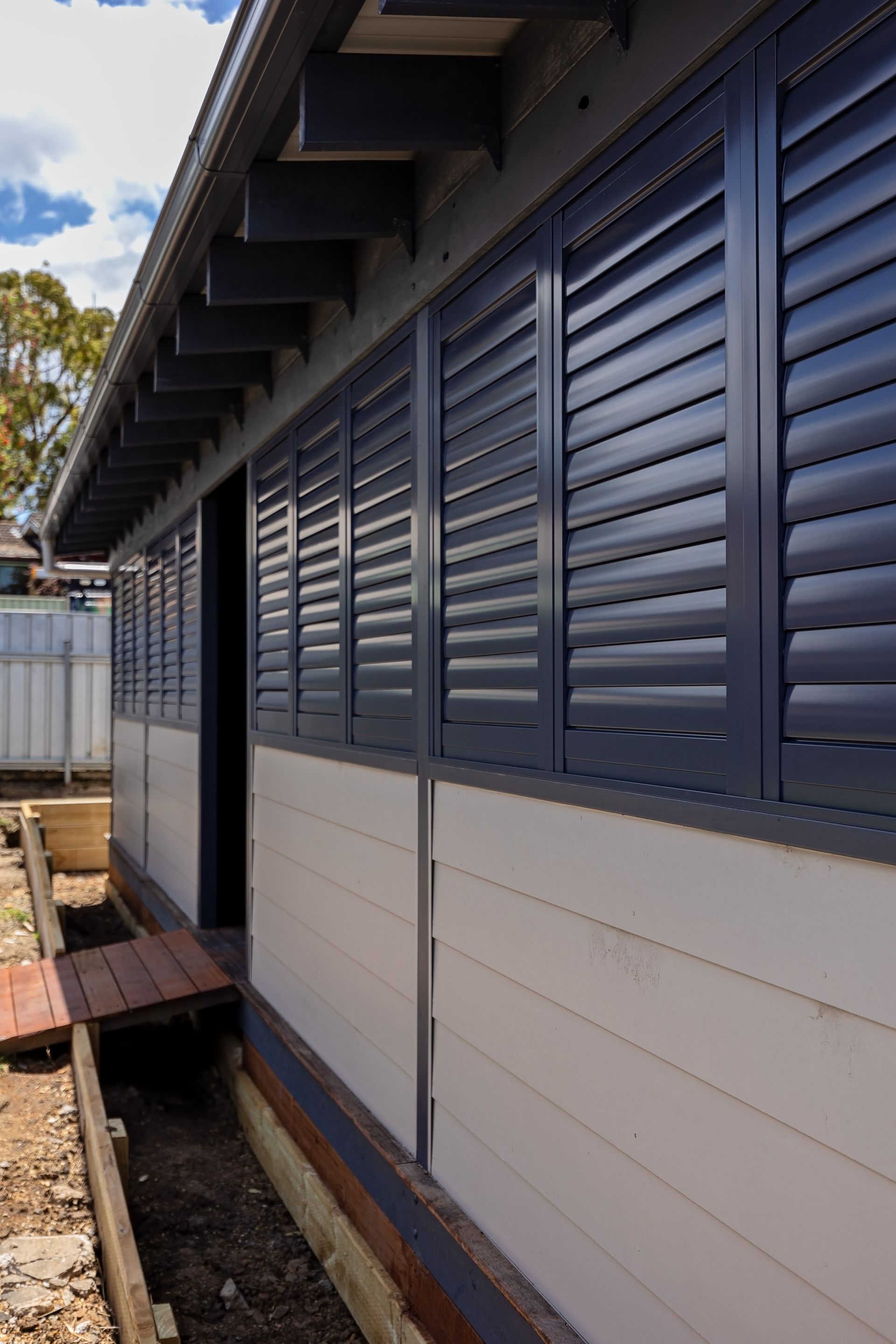 A House with Blue Shutters — New Blinds and Shutters in Maryland, NSW