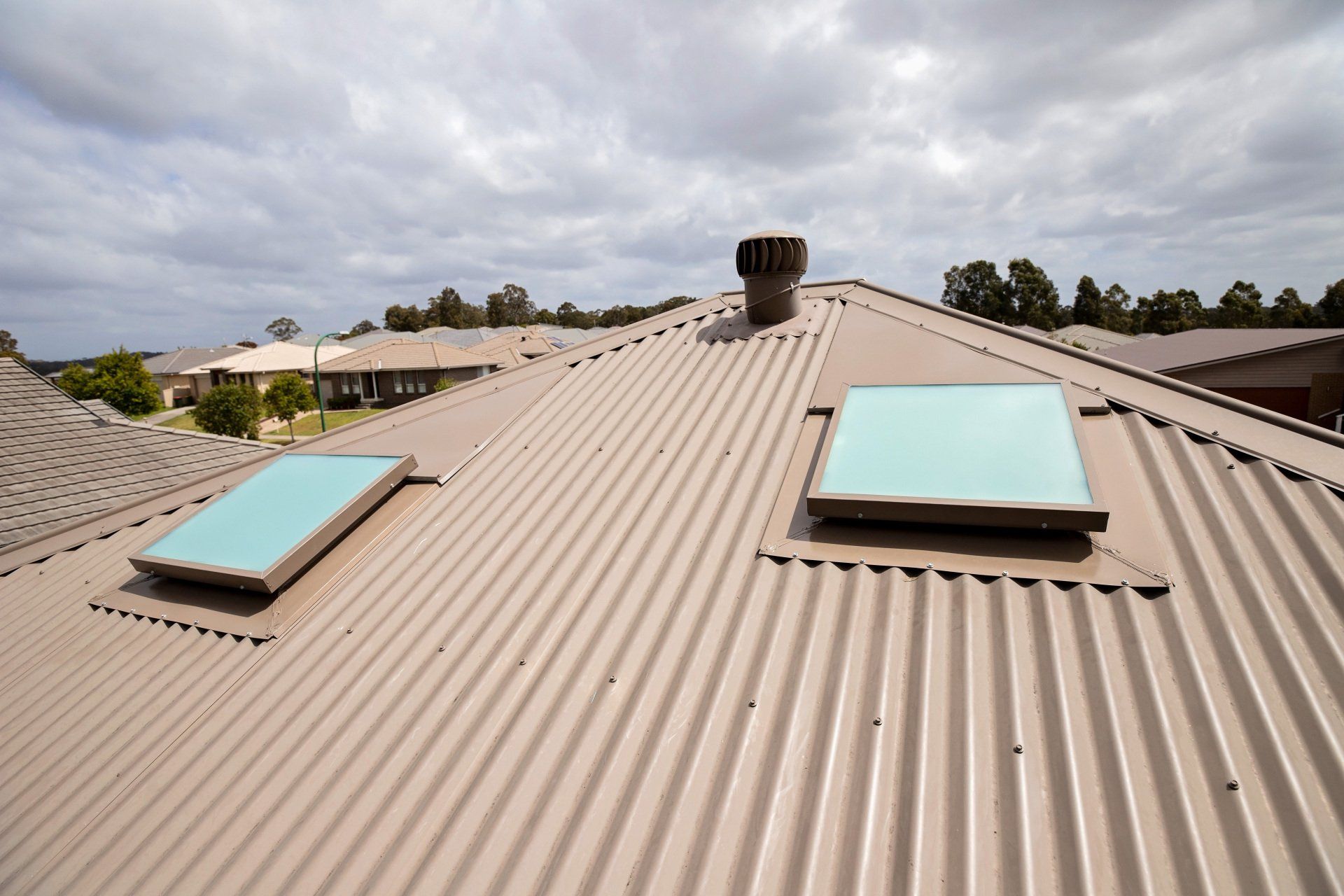 The Roof of A House Has Two Skylights on It  — New Blinds and Shutters in Maryland, NSW