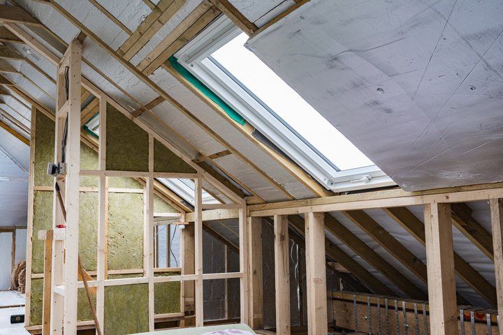 There Is a Skylight in The Attic of A House Under Construction — New Blinds and Shutters in Maryland, NSW