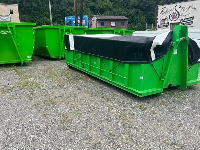 Parked Green Dumpster — Pittsburgh, PA — Greater Pitt Dumpster Service