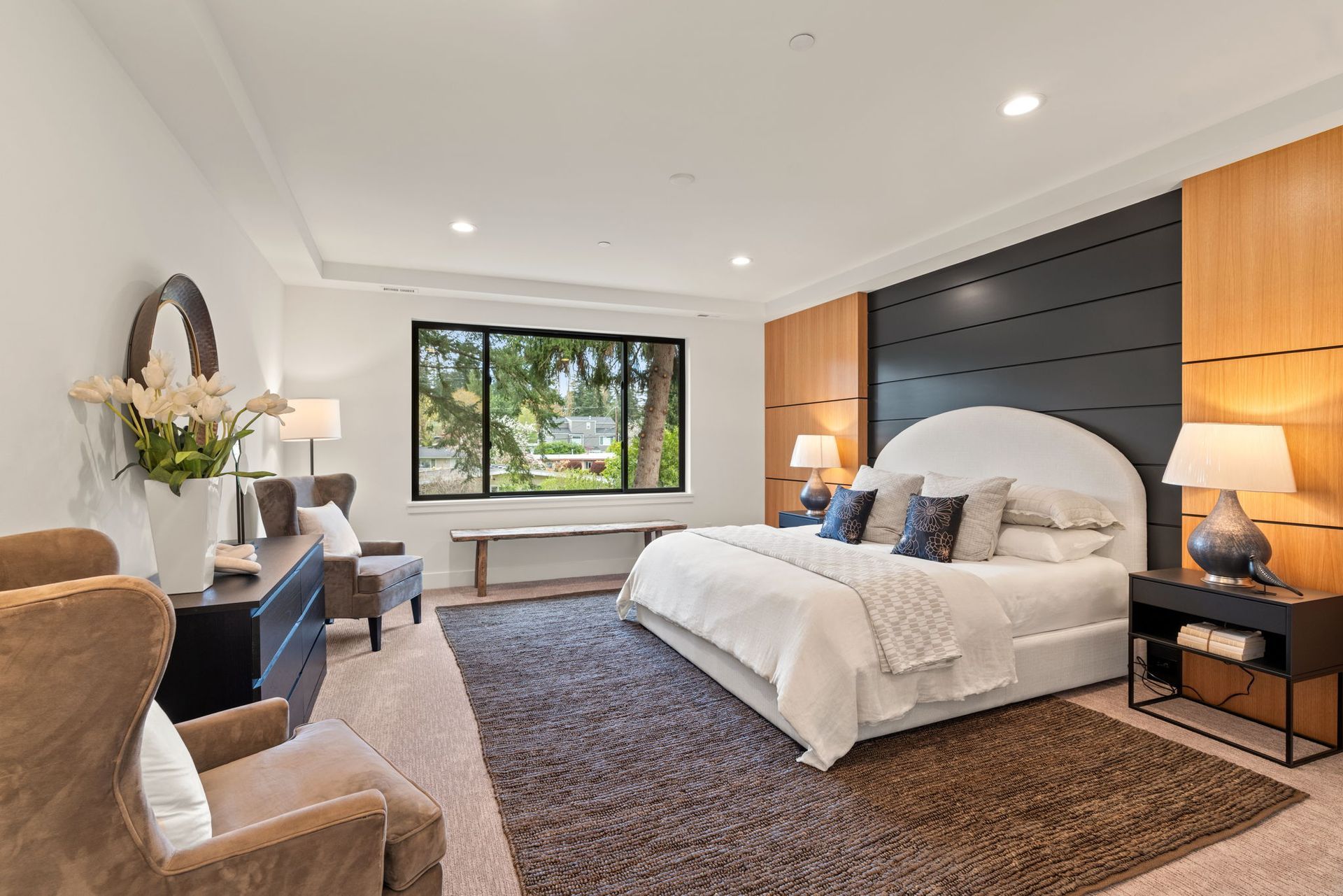 There is a large bed in the middle of the room.