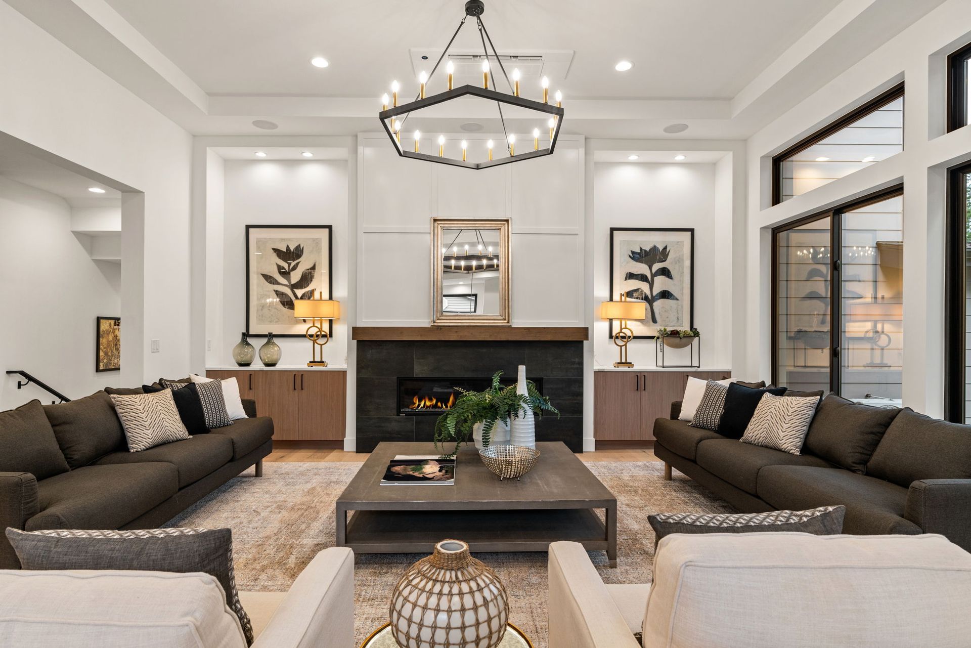 A living room filled with furniture and a fireplace.