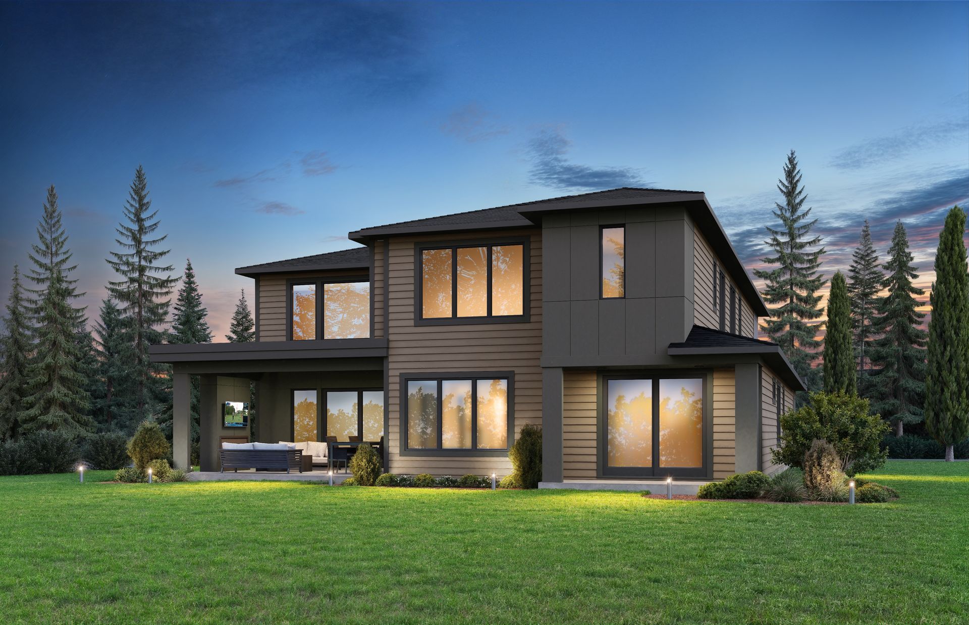 Modern two-story house with dark siding and large windows, set on a green lawn with trees in the background.