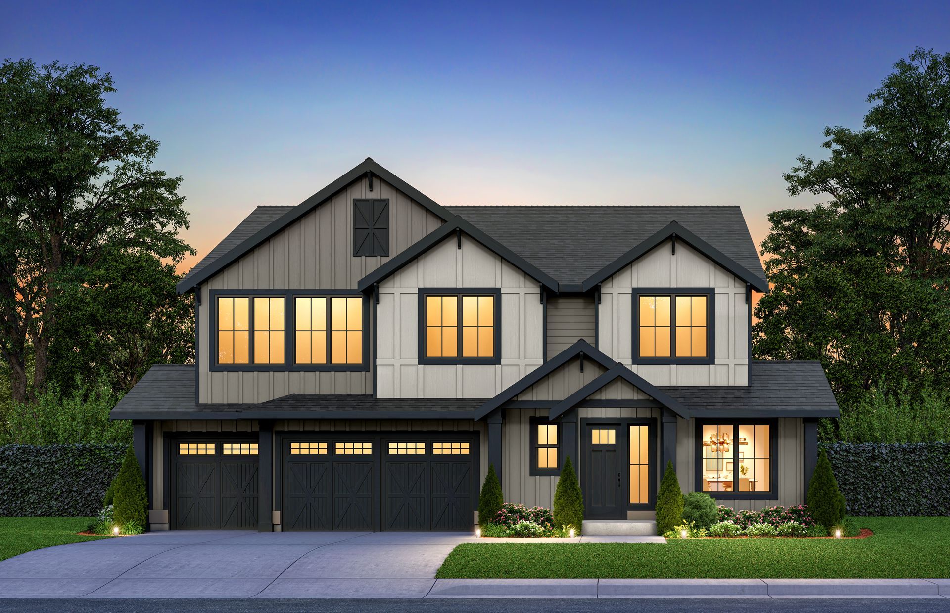 A black and white house with a lot of windows and a garage.