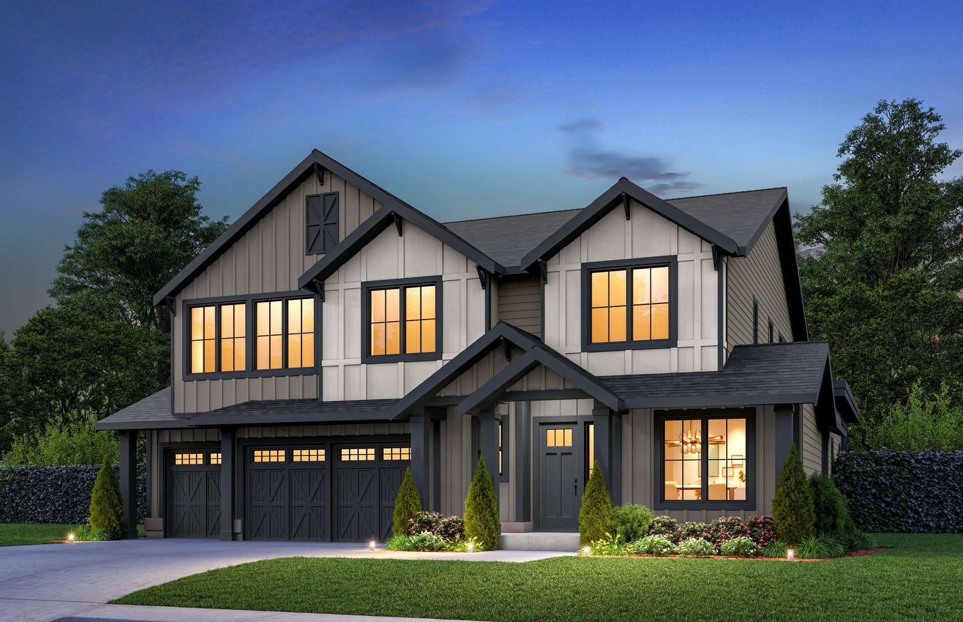 A large house with a lot of windows is sitting on top of a lush green lawn.