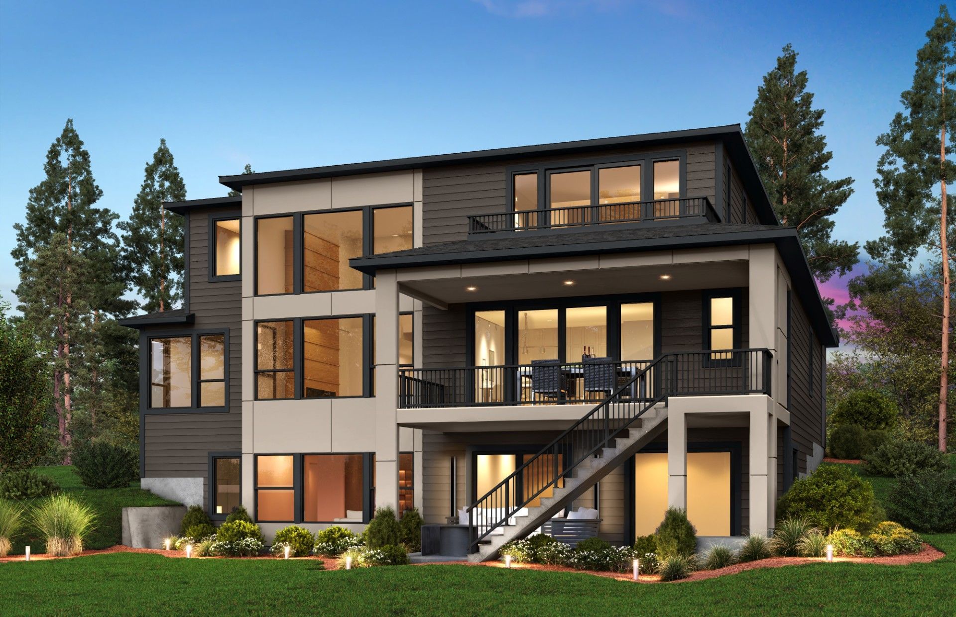 A large house with a lot of windows is sitting on top of a lush green field.
