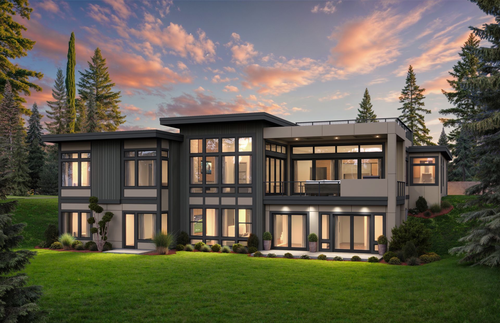 Modern two-story house with large windows, surrounded by trees, at sunset.