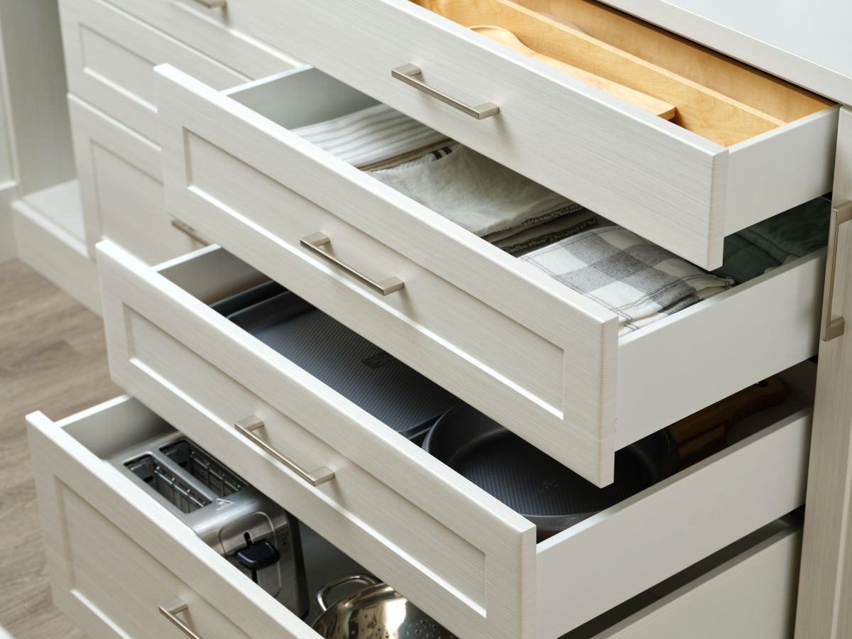 A kitchen drawer with a toaster oven in it