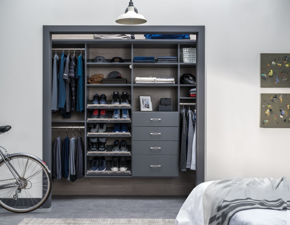 A closet with a bicycle parked in front of it