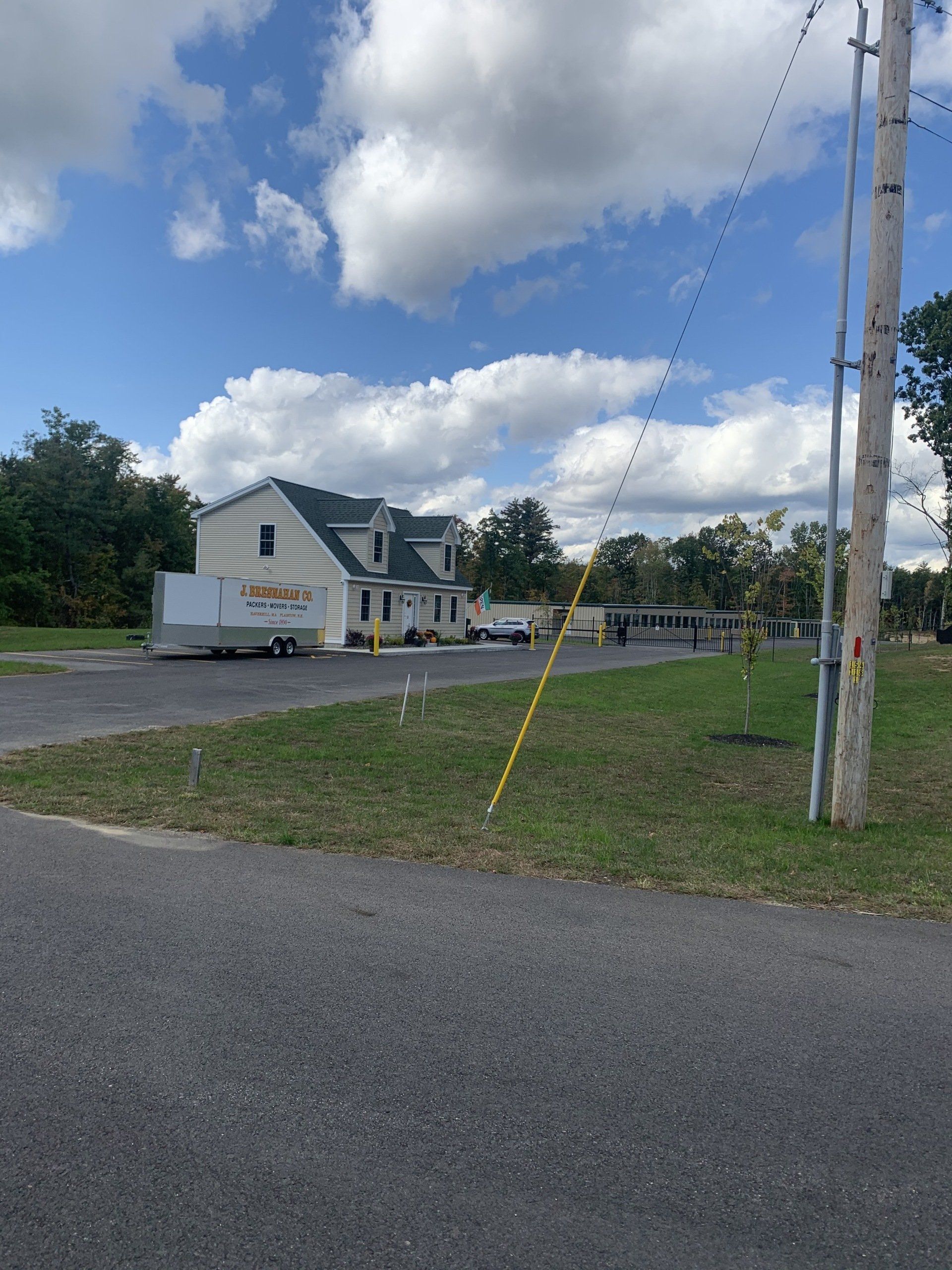 view of Kingston facility with Bresnahan trailer near the building