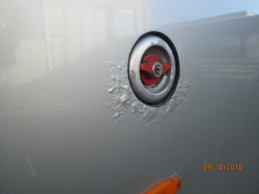 danno da umidità su pullman grigio