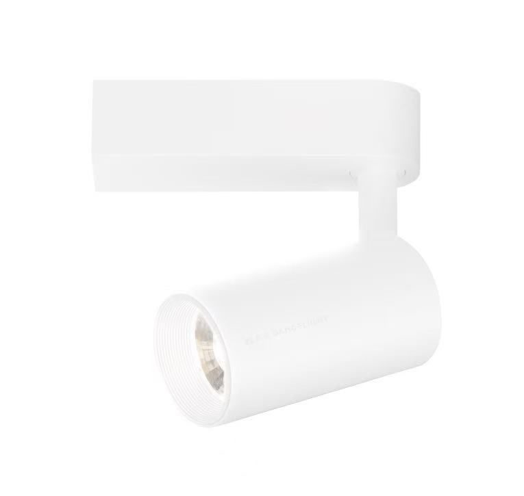 White track lighting fixture, cylindrical head, mounted on a horizontal bar.