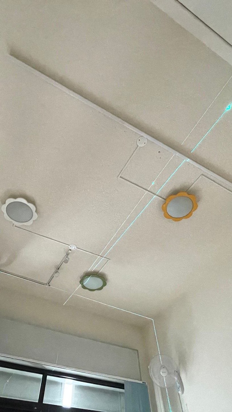 White ceiling with recessed lighting. Electrical wiring is visible.