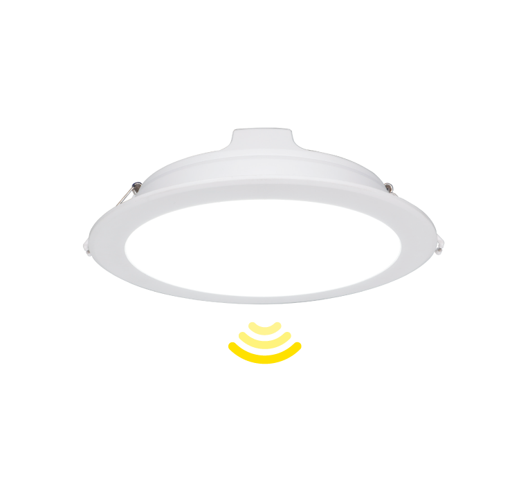 White recessed ceiling light with an integrated motion sensor, emitting yellow light waves.