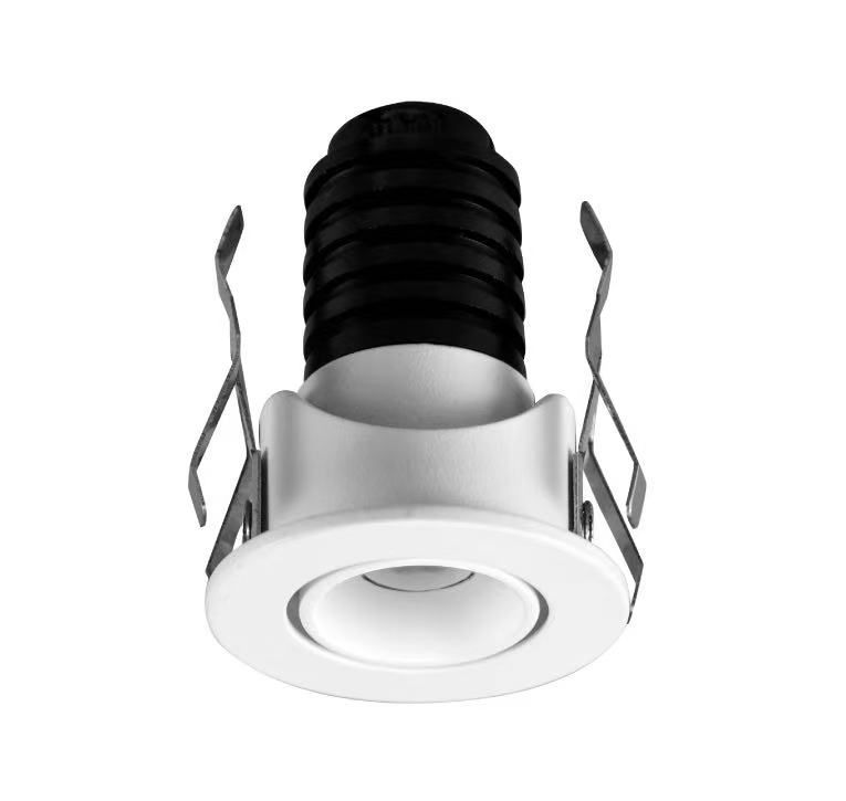 White recessed LED spotlight with black adjustable housing and metal mounting clips.
